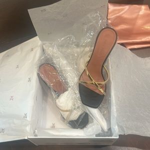Amina Muaddi Gold and Black Sculptural Heels